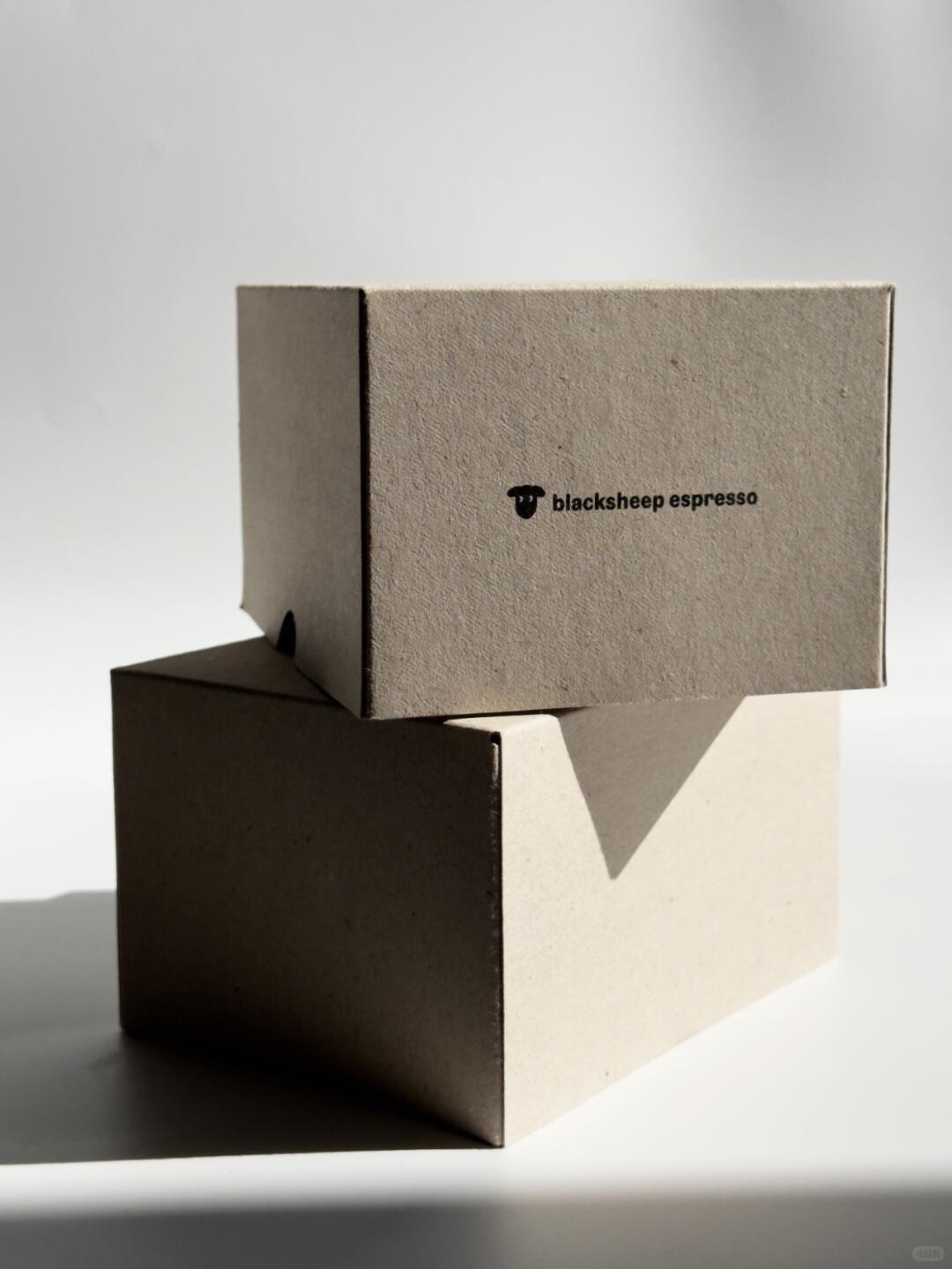 Stacked greyboard coffee boxes showing the compact structure
