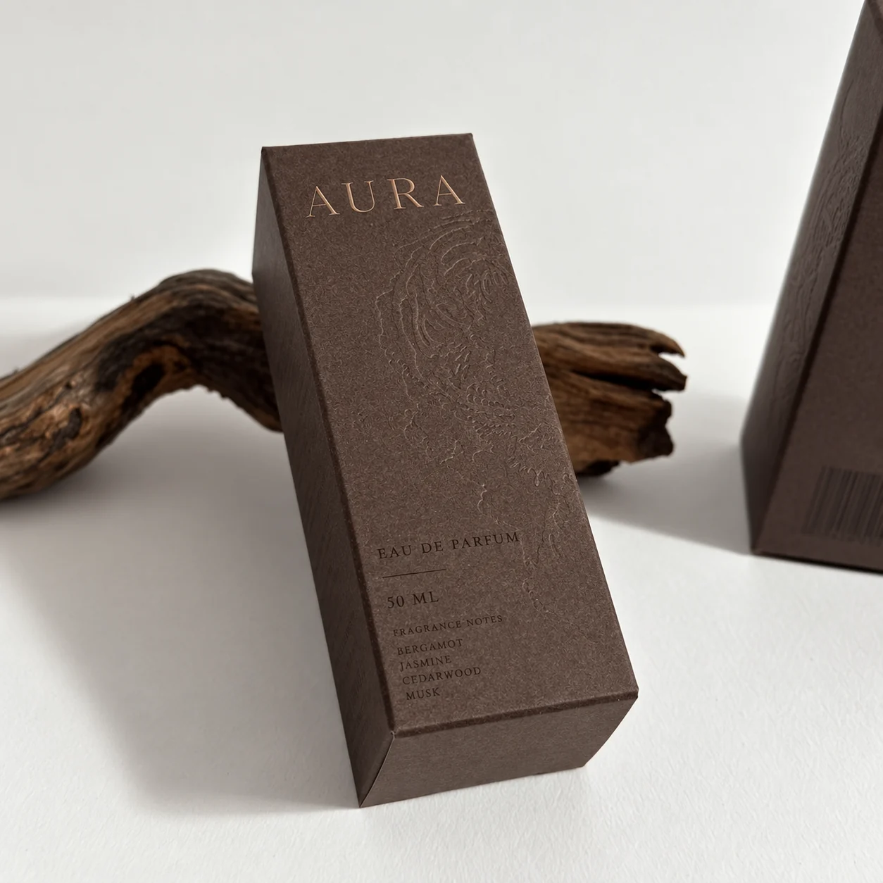 Brown specialty paper perfume carton box with embossed artwork