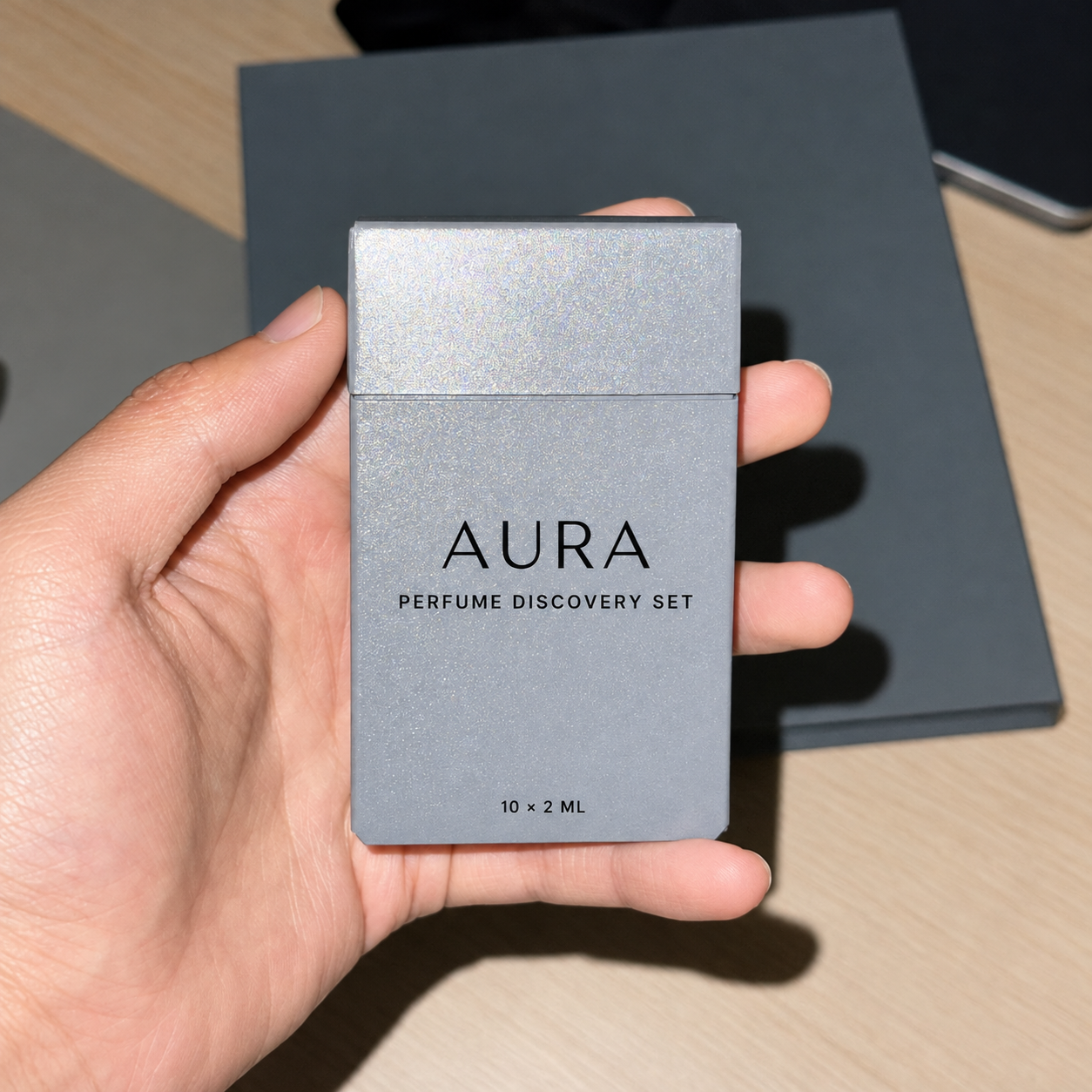 Closed gray perfume discovery set box for ten 2ml vials
