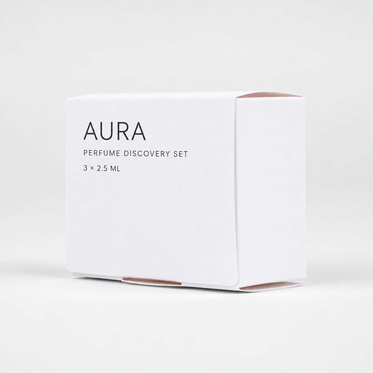 Closed white three-vial perfume discovery set box