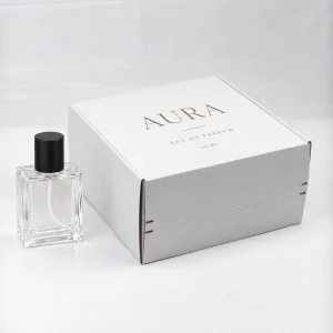 White tear-strip mailer perfume box with insert and bottle