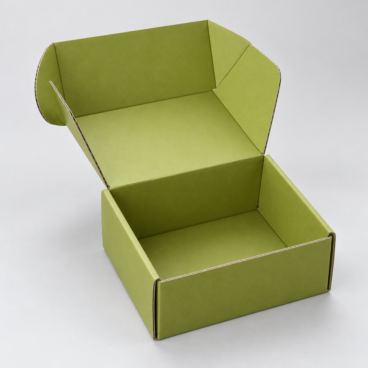 Lime Green Fold-Flat Mailer Box with Silver-Tone Mark: closed green lid with a small silver-tone geometric mark