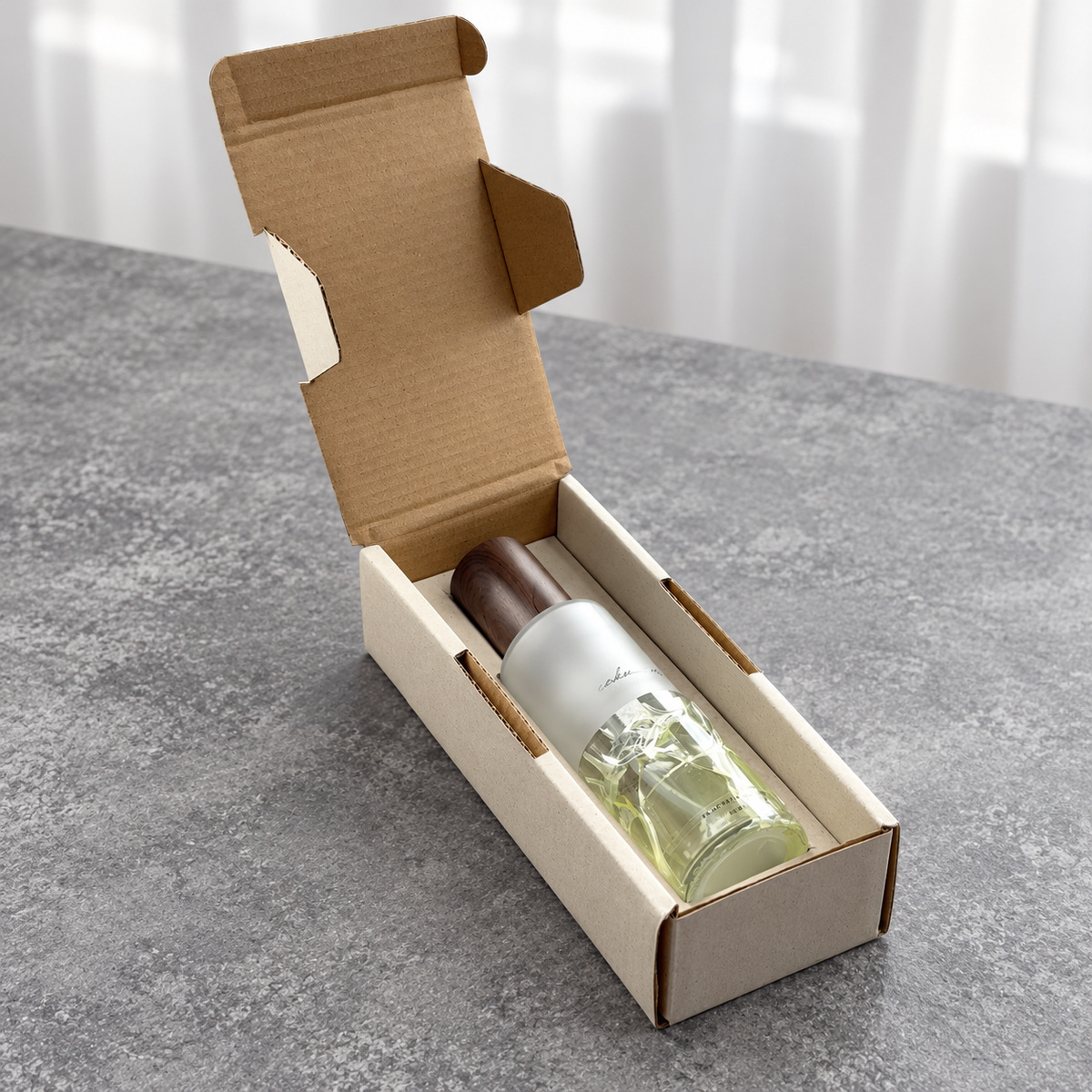 Closed three-quarter view of the long cream room spray mailer box