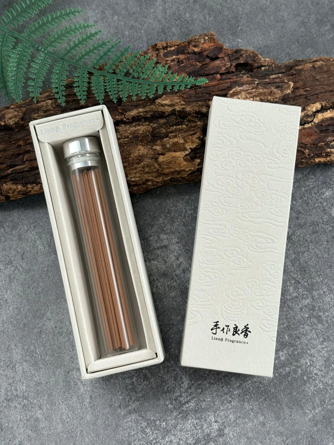 Ivory Cloud-Texture Incense Tube Gift Box: open paper support holding a sample glass incense tube; tube and contents not included