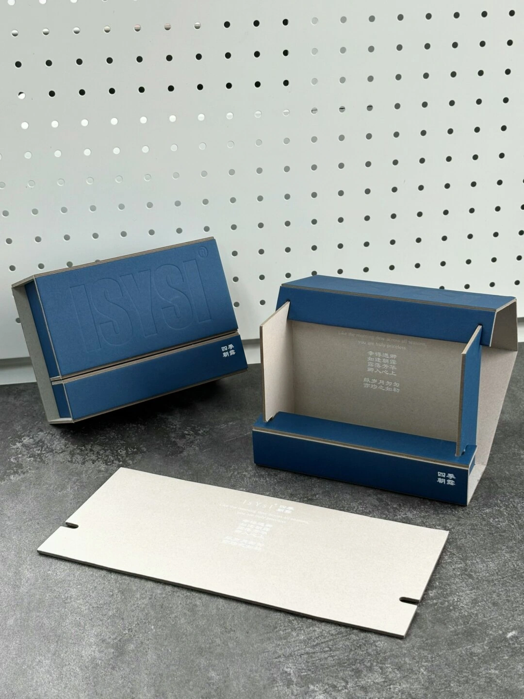 Deep Blue Blind-Imprint Board Gift Box: close-up of the blue paper, pressed lettering and exposed board edge