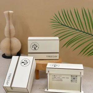 Ivory TREESAY gift boxes showing different sides and printed details