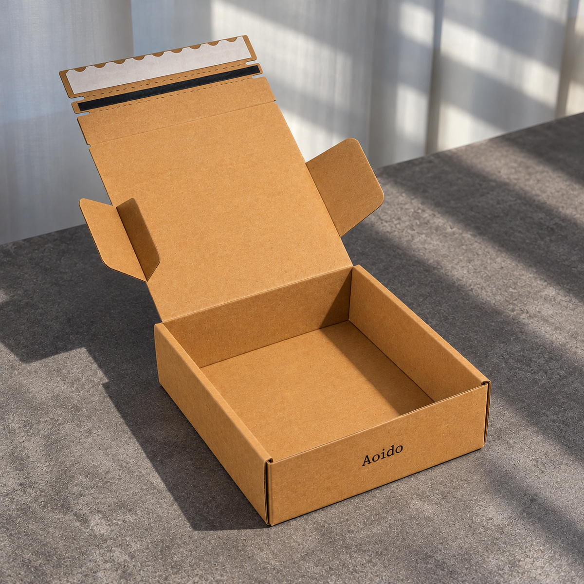 Kraft tear-strip mailer box with fitted folded corrugated insert
