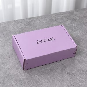 Lavender Tear-Strip Fold-Flat Mailer Box: closed box showing the exterior printing and lid