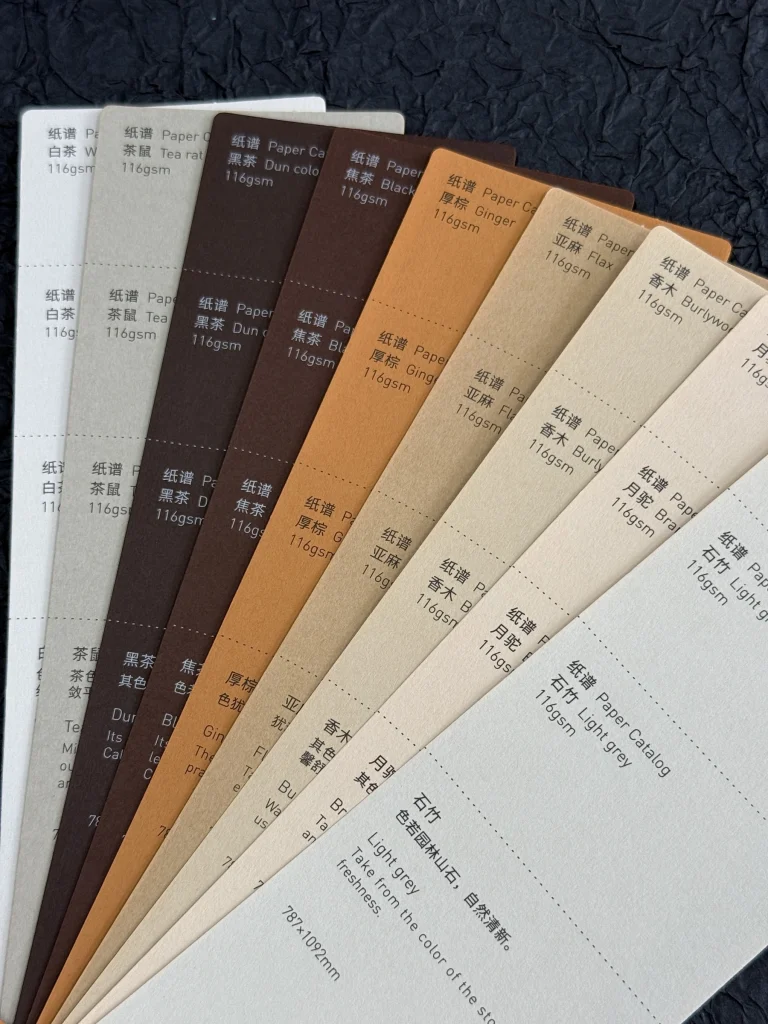 Brown, beige, cream and pale gray paper cards with printed sample labels