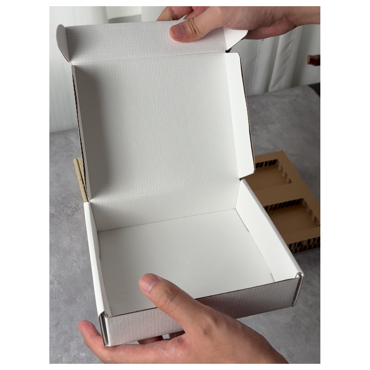 White Linen-Texture Paper Mailer Box: close-up of the paper surface, finish and folded edge