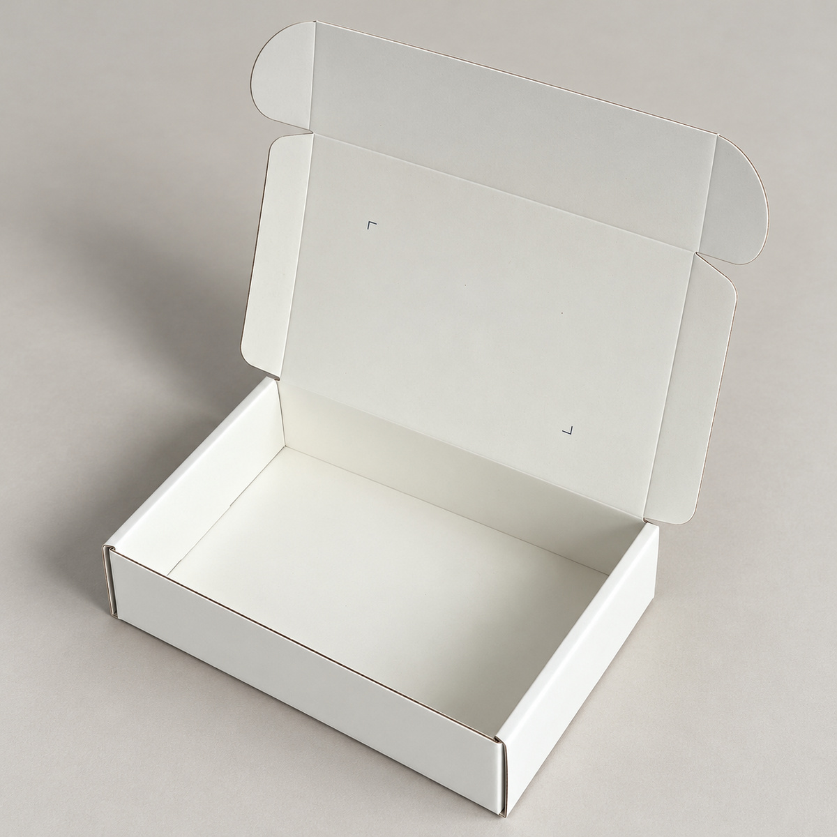 White Minimal Print Fold-Flat Mailer Box: open box showing the interior and folding lid structure