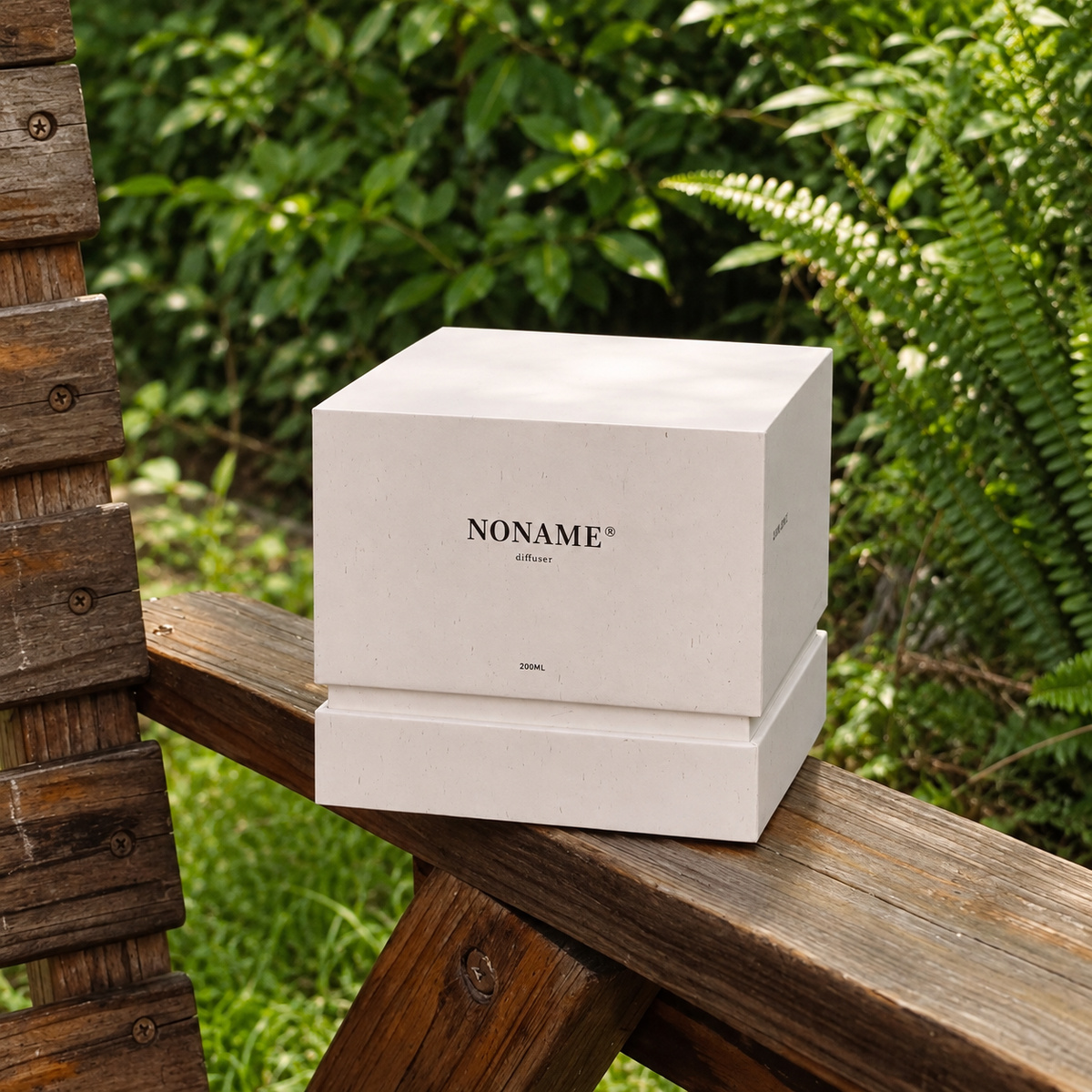 White Shoulder-Neck Reed Diffuser Gift Box: closed white shoulder-neck diffuser box photographed outdoors